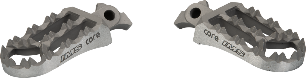 IMS Core Enduro Footpegs 56-47313E for motorcycle, showing durable metal footpegs with grip surface and mounting hardware.