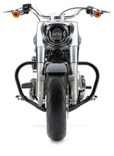 Load image into Gallery viewer, Black Cobra Freeway Bars Vbend 1.25" body protection for Harley Davidson 2018-2025 models, with sturdy metal construction.