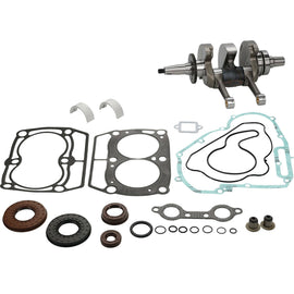 Hot Rods Bottom End Kit engine components, including crankshaft and connecting rods, arranged on a workbench.