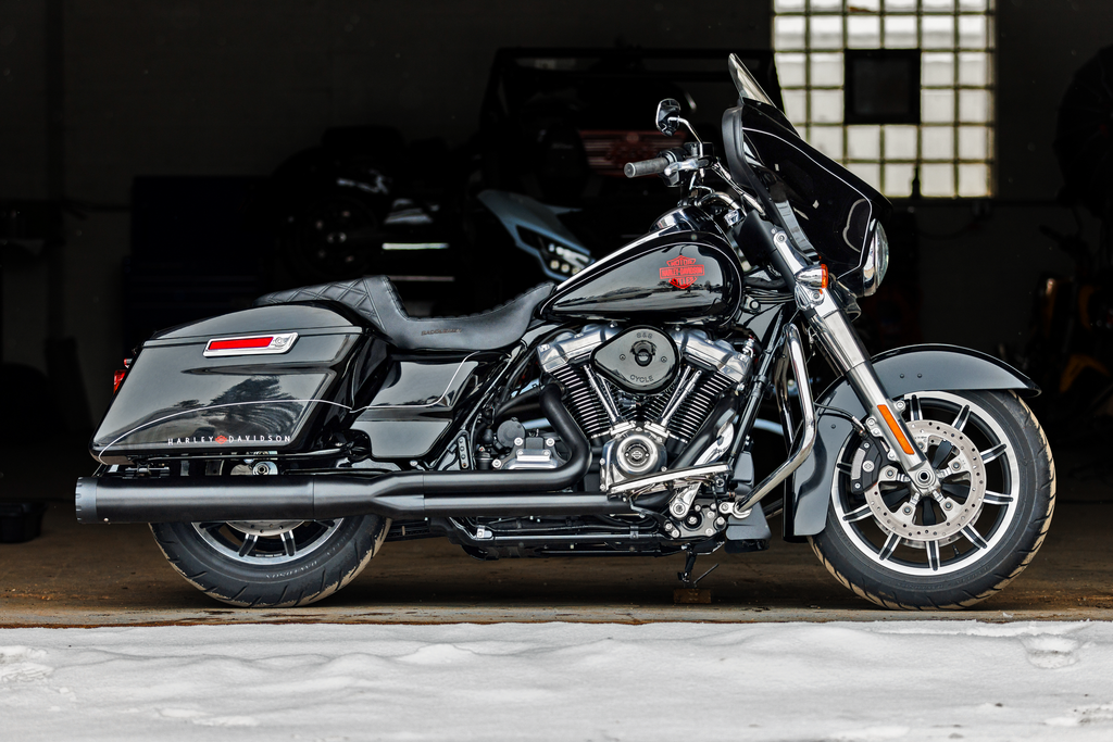 FireBrand Monarch 2-1 black motorcycle exhaust for M8 Touring models 2017-2023, showing the sleek exhaust pipe and silencer.