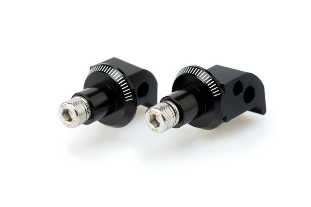 Black PUIG passenger footpeg adapter for Yamaha motorcycle, part of the foot controls system.