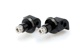 Black PUIG passenger footpeg adapter for Yamaha motorcycle, part of the foot controls system.