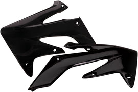 Black Acerbis radiator shrouds for motorcycles, featuring a sleek design with mounting points and brand logo visible.