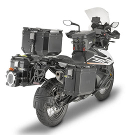 GIVI Outback side case hardware and fasteners for motorcycle luggage, shown in a close-up image.