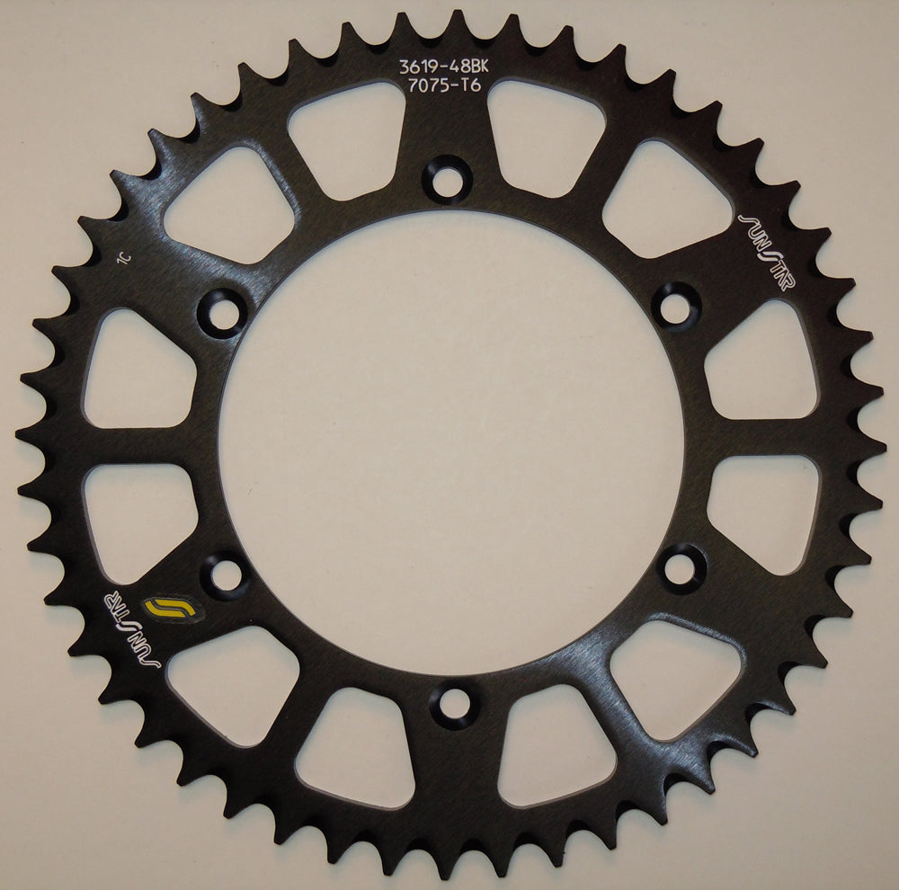 Sunstar aluminum rear sprocket 52-tooth for Kawasaki and Suzuki street motorcycles, black finish with 520 chain compatibility.