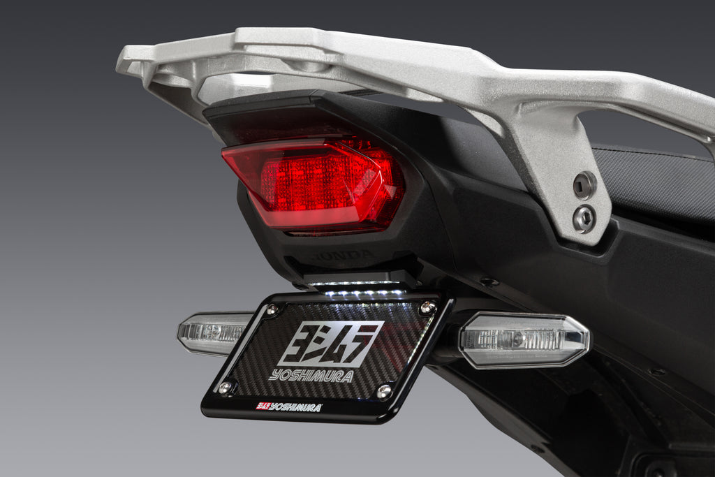 Yoshimura Fender Eliminator body kit for motorcycle, showing sleek black design and mounting hardware.