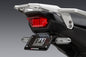 Yoshimura Fender Eliminator body kit in black, designed for motorcycle rear end cleanup, with mounting hardware visible.