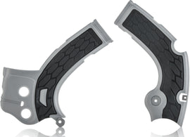 Acerbis X-Grip off-road frame guard in silver and black mounted on motorcycle frame, designed for durable protection.