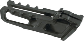 Acerbis black chain guide for motorcycle, featuring durable plastic construction with mounting points visible.
