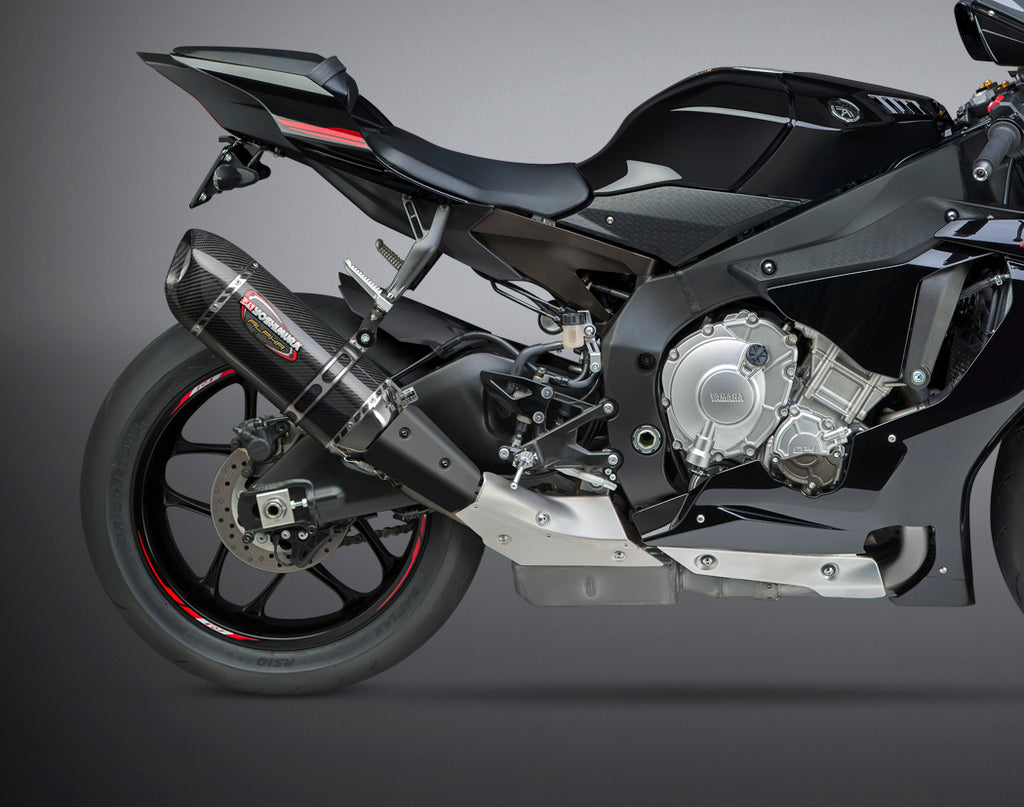 Yoshimura Signature Alpha Slip-On exhaust with stainless steel and carbon fiber components for motorcycle performance.