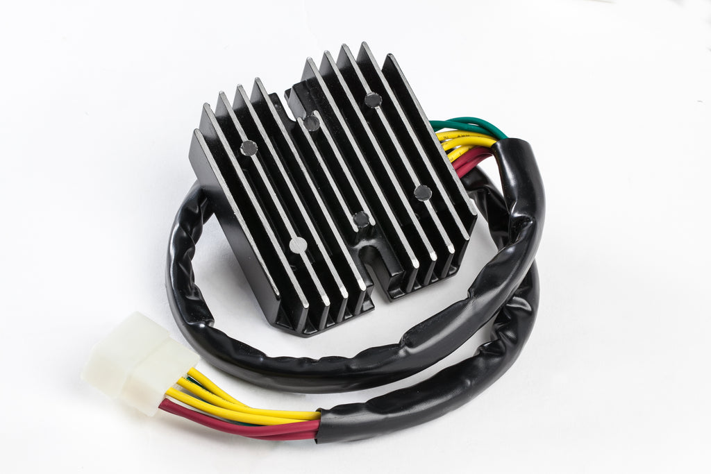 Ricks Motorsport Electric regulator and rectifier for motorcycle electrical systems, with metal and plastic components visible.
