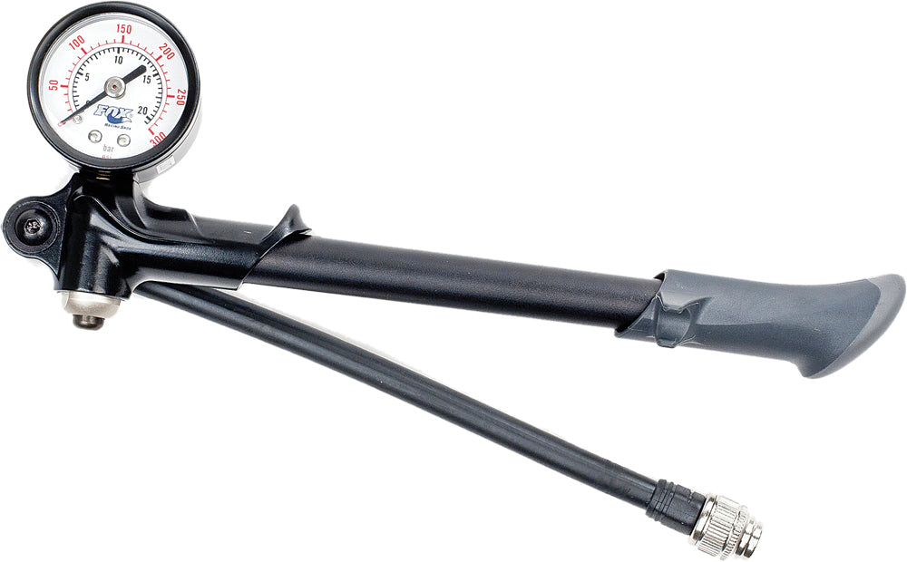 Fox dual-sided shock pump with digital gauge, 300psi max, used for mountain bike suspension maintenance.