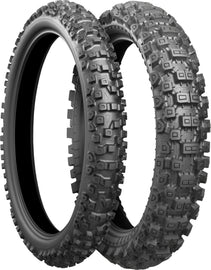 Bridgestone Battlecross X40 front motorcycle tire, 90/100-21 size, bias Tt 874-1219, designed for off-road and motocross riding.