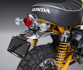 Yoshimura Fender Eliminator Kit for Honda motorcycles, black body with mounting hardware and sleek design.