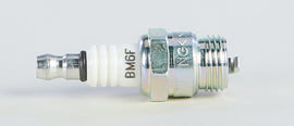 NGK Spark Plug #6221/10 2-BM6F showing the metal terminal and ceramic insulator in a close-up view.