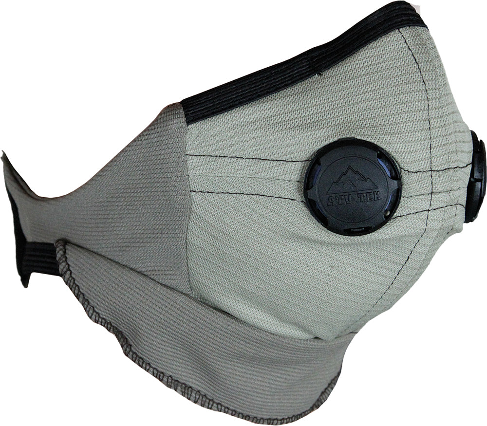 ATV-TEK Dust Mask in tan color with adjustable straps and breathable material, designed for outdoor riding and dust protection.