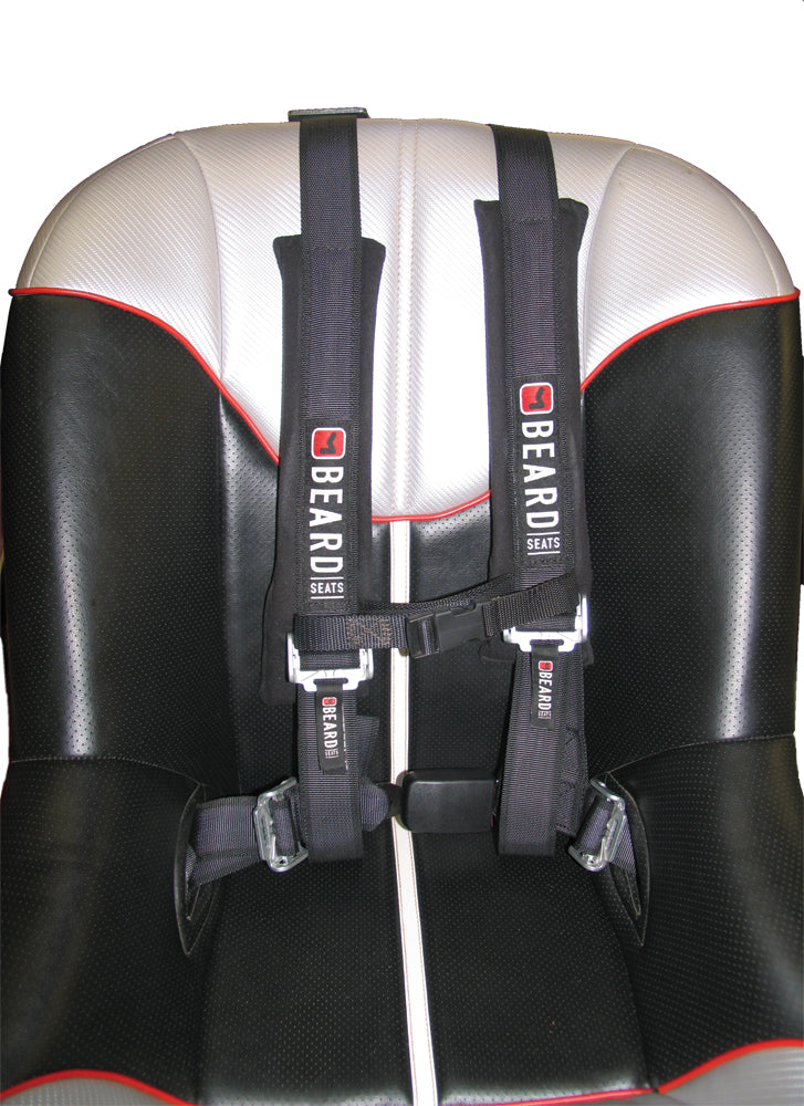 Beard Seats safety harness with latch and link buckle, padded protective safety gear for secure restraint in vehicle or equipment.