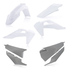 Acerbis plastic body kit for Hus motorcycle, showing assembled white and black plastic panels with mounting points.