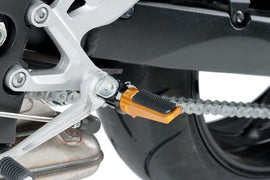 PUIG Sport Gold Footpegs for motorcycle foot controls, featuring durable design and gold finish for enhanced style and performance.