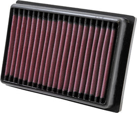 K&N Air Filter 709910 for improved engine airflow, showing the reusable, pleated cotton filter element with rubber frame.