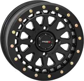 System 3 SB6 BL Wheel for Polaris RZR, 15x7 matte black with 4+3 offset and +10mm spacing, shown on the vehicle.