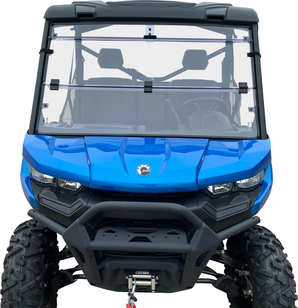 Open Trail folding windshield for off-road vehicles, clear windscreen with black mounting frame, designed for durability and easy folding.