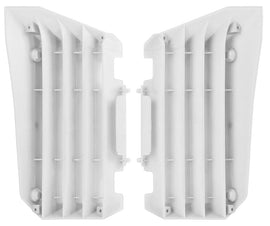 Polisport Plastics white radiator louvers for off-road vehicles, model 64-56503, shown on a vehicle in this image.