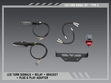 Load image into Gallery viewer, Yoshimura Fe V2 Standard LED turn signal kit installed on vehicle body, showcasing sleek design and bright LED lights.