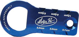 Motion Pro spark plug gap tool 57-8579, a compact tool for adjusting spark plug gaps, shown with measurement markings.