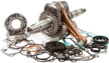 Load image into Gallery viewer, Hot Rods Bottom End Kit for engine assembly, featuring pistons, crankshaft, and connecting rods, assembled in a clean workspace.