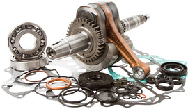 Hot Rods Bottom End Kit for engine assembly, featuring pistons, crankshaft, and connecting rods, assembled in a clean workspace.