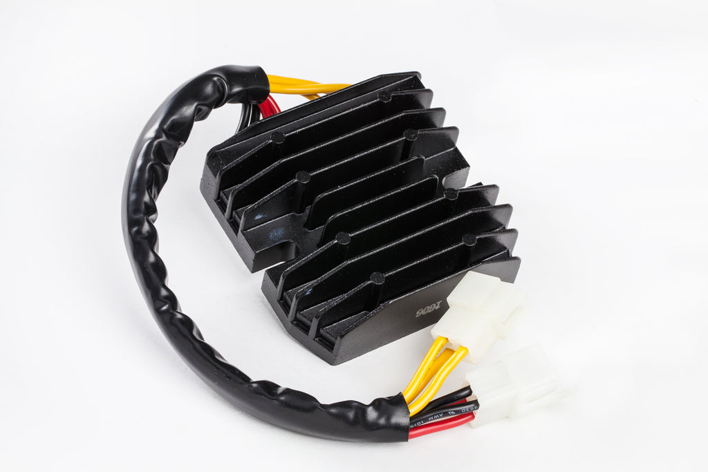 Ricks Motorsport Electric regulator and rectifier for motorcycle electrical system, with metal mounting brackets and electrical connectors.