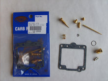 Load image into Gallery viewer, K&amp;L Carburetor Repair Kit 118-2555 for intake and fuel system, showing assorted gaskets, seals, and small repair parts.