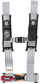 Pro Armor 4-point harness with 3-inch pads for Polaris RZR, showing black safety straps and padded shoulder cushions.