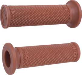ODI Grips Ruffian Slip-On grips in graphite color, designed for BMX or motorcycle handlebars, shown on a product image.