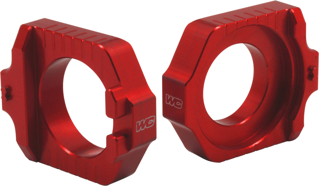 WORKS Axle Blocks Elite KTM/Hus Red drive axle blocks for motorcycle maintenance and stability, shown in red with black accents.