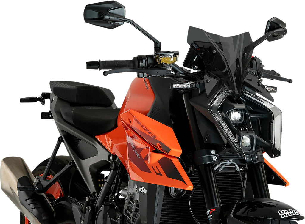 PUIG Naked New Gen Sport dark smoke windshield for KTM motorcycle, showcasing sleek, tinted windscreen design.