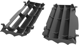 Black Polisport Plastics radiator louvers for motorcycle, part number 64-56519, installed on a vehicle, showing their sleek design.