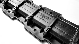 Super Clamp traction bar kit with mounting brackets and hardware, featuring six durable clamps for secure installation.