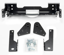 Charger l'image dans la galerie, Warn front plow mounting kit with brackets and hardware, designed for secure installation on compatible vehicles.