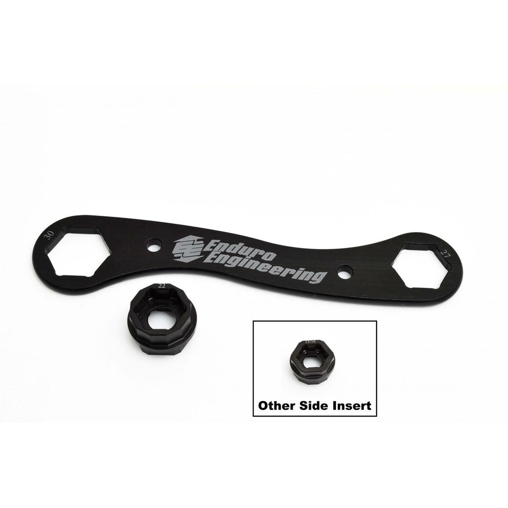 Enduro Engineering trail multi-tool with 22mm, 27mm, and 30mm socket sizes for bike maintenance, lying on a white background.