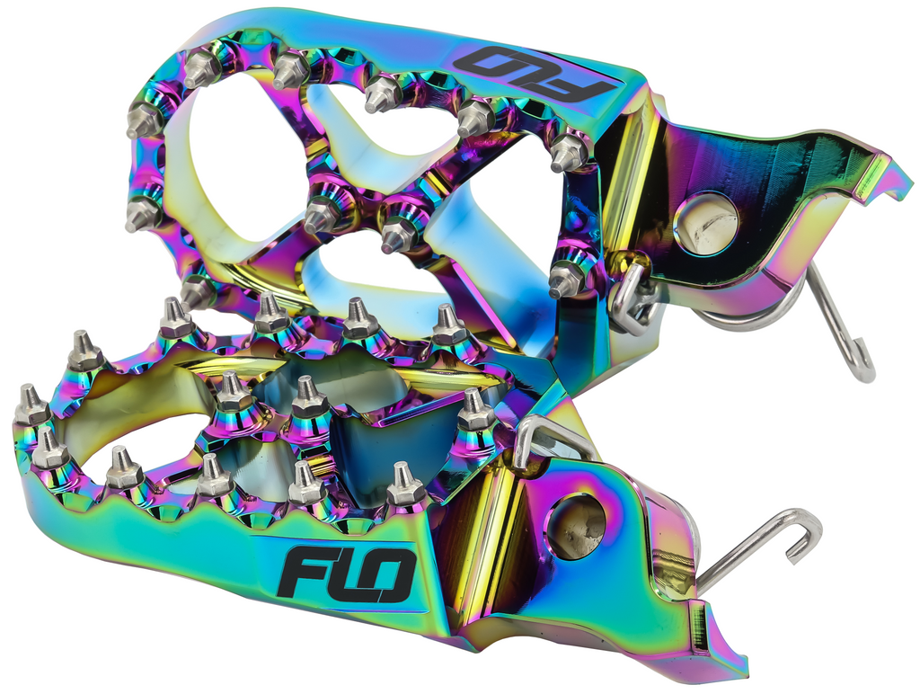 Flo Motorsports Pro Series Foot Pegs Jet Fuel for motorcycles, showing durable metal foot controls with textured surfaces for grip.