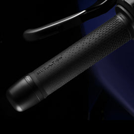 RIZOMA Mutation P1 black motorcycle grips with textured rubber surface and ergonomic design for enhanced grip and control.