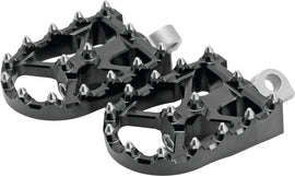 Black Flo Motorsports BMX style foot pegs with metal pins and textured surface for grip, designed for BMX bikes.