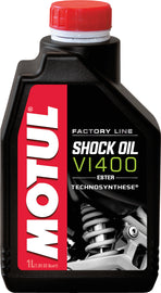 Motul Shock Oil Factory Line V1400 1L bottle, high-performance motorcycle suspension shock oil in a clear container.