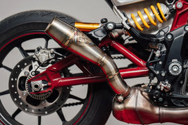Sawicki Speed Shop FTR 1200 slip-on exhaust with brushed stainless steel finish, showcasing the sleek, cylindrical design.