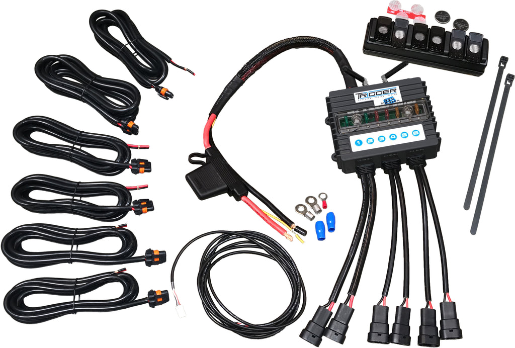 BLU Trigger 6 Switch System 71-9157 electrical device with multiple switches and wiring components, mounted on a panel.