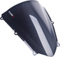 PUIG Racing Carbon Look Windscreen Hon 561-1113C mounted on motorcycle with aerodynamic design and sleek carbon finish.