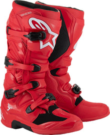 Bright red Alpine Star Tech 7 motocross boots with black accents and sturdy design, shown from a side angle.