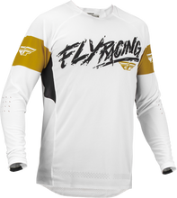 Load image into Gallery viewer, Fly Racing Evolution DST L.E. Brazen jersey in white, gold, and black, shown with detailed fabric and design elements.